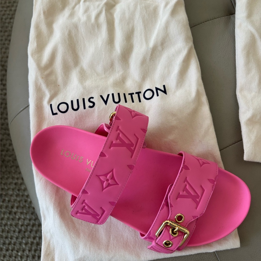 Pink sandals , excellent condition. Dust bags included.  Size 7 USA